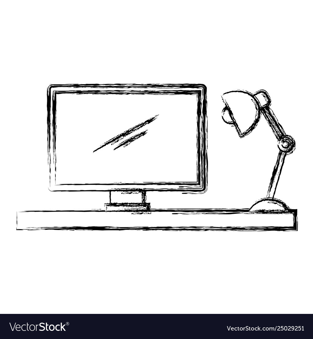 Office desk with computer and lamp