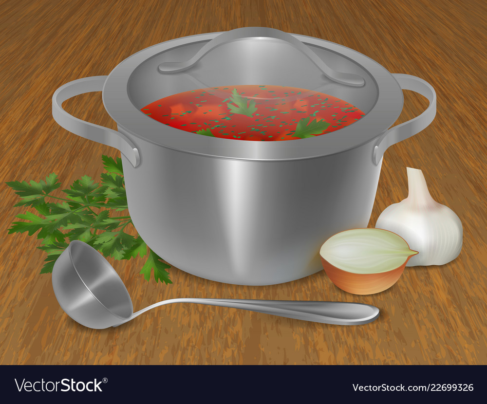 Red soup in a pot with onions parsley and garlic