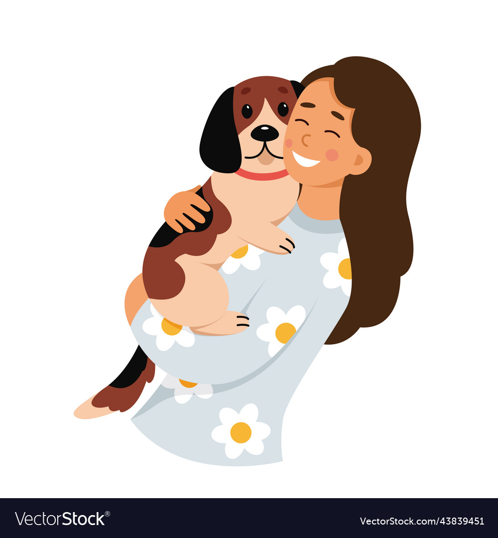 Young woman holding dog in hands cute cheerful