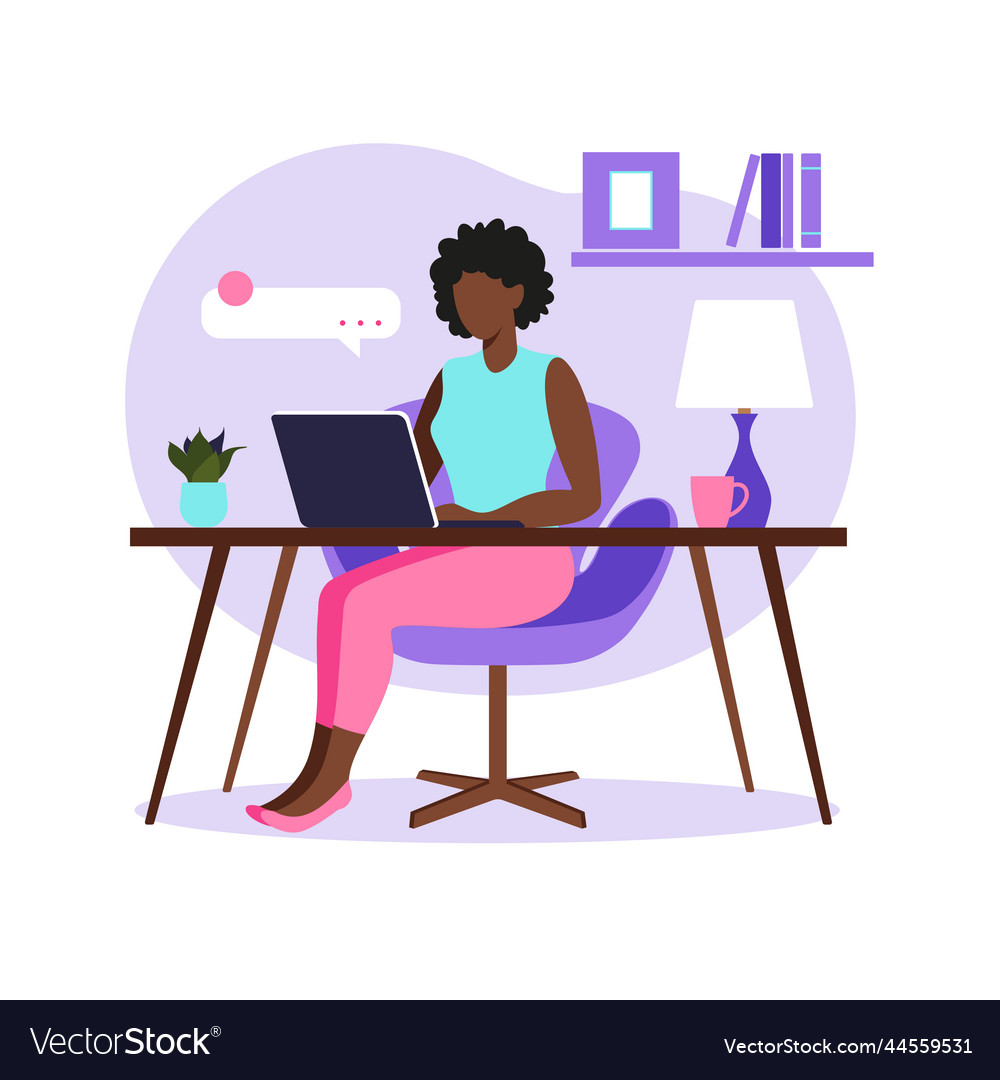 African woman sitting table with laptop working