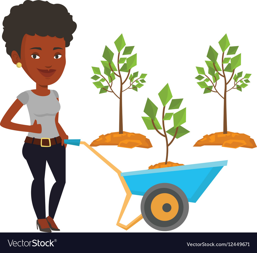 Woman pushing wheelbarrow with plant