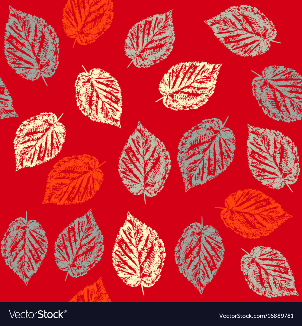Seamless pattern with leaves on red background