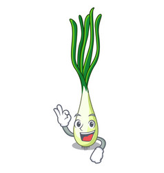 Wink cartoon fresh green onions on cutting board Vector Image