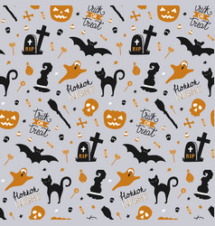 Seamless pattern with cartoon halloween attributes