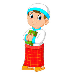 Boy is sitting and reading al quran Royalty Free Vector