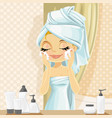 cute girl in turban washes facial wash vector image vector image