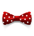 red polka dot bow tie isolated on white vector image