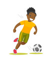 Black soccer player kicking the ball Royalty Free Vector