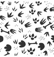 dinosaur footprints seamless pattern background vector image
