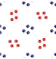 blue and red paw print icon isolated seamless vector image vector image