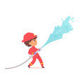kid firefighter with hose boy fireman in red vector image vector image