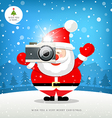 merry christmas santa claus hand holding camera vector image