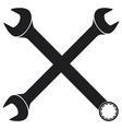 crossed wrenches silhouette vector image