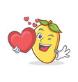 mango character cartoon mascot with heart vector image