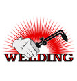 welding machine in hand symbol for business vector image vector image