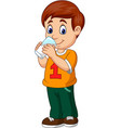 cartoon boy drinking milk vector image