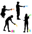 set silhouette man and woman holding a spray vector image