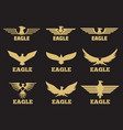 gold heraldic eagles logo collection on black vector image vector image