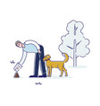 man cleaning after dog during walk in park pet vector image