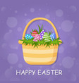 easter colorful eggs and green grass in basket vector image vector image