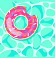 pink donut swim ring floating on water background vector image vector image