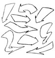 set hand-drawn doodle black arrows vector image