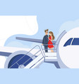 guy and girl go downstairs from plane vector image vector image