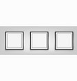 three square black frames hanging on a gray vector image