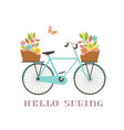 retro blue bicycle with flowers in baskets icon vector image