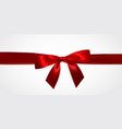 realistic red bow with ribbons isolated vector image