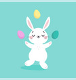 white easter bunny juggling with colorful eggs vector image