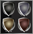 silver shields with laurel wreaths vector image