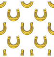 seamless pattern with gold horseshoes vector image