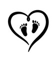 black silhouette of heart baby footprint sign vector image