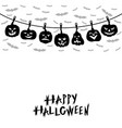 halloween pumpkins hanging on a clothespin rope vector image