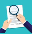 hand holding magnifying glass over a contract vector image