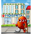 a multi-eyed monster in front of the hospital vector image vector image