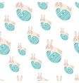 seamless pattern with cute rabbits and easter eggs vector image vector image